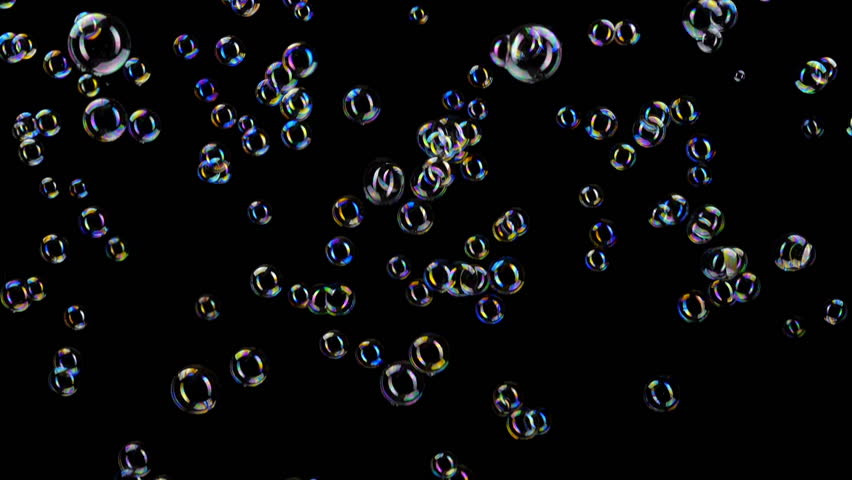 Colorful soap bubbles fly acr