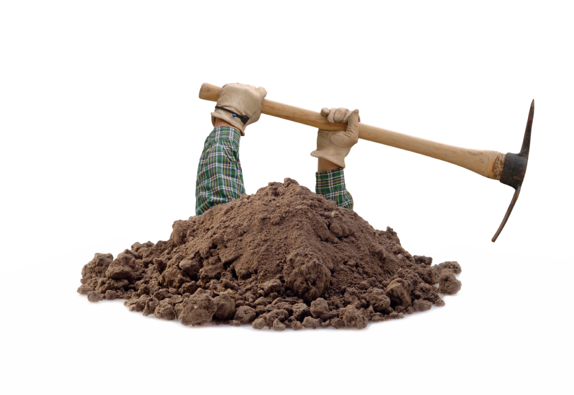 shovel digging Royalty Free V
