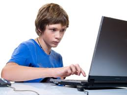 girl using a laptop computer