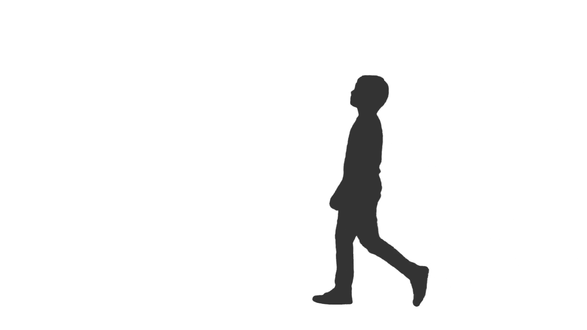 Silhouette of a man walking w