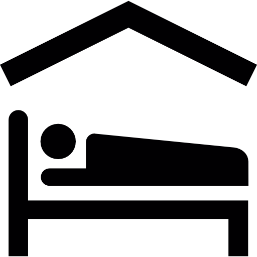 Person lying on bed inside a 