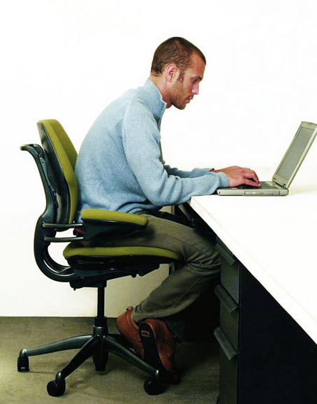 Man Sitting On Office Chair A