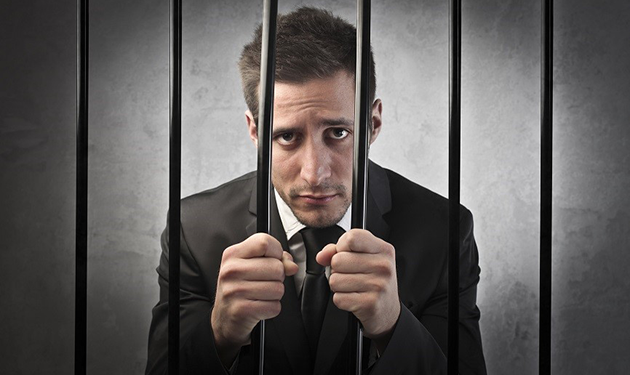 Man behind bars slowly closes