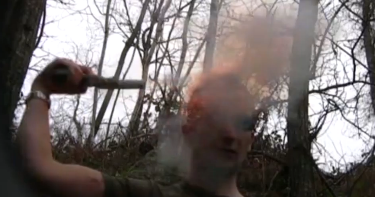 Man fires flare gun at his he