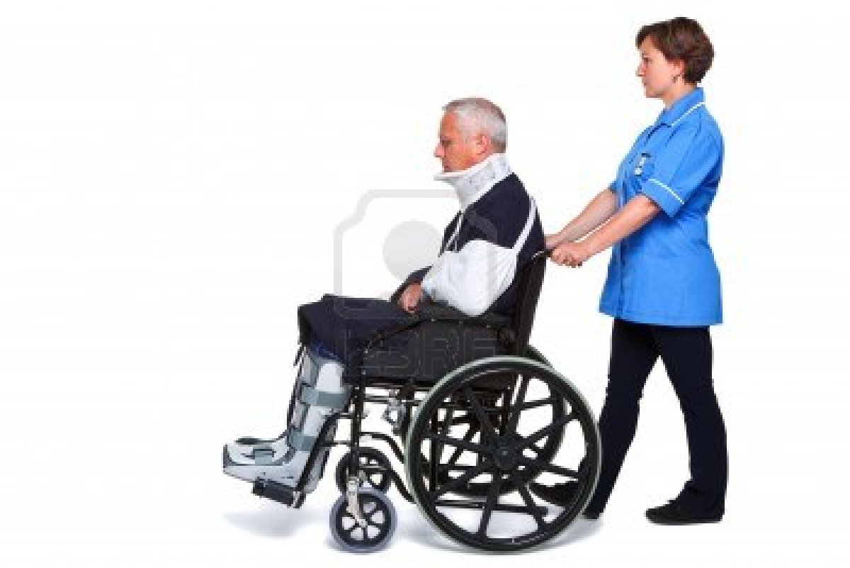 Man Pushing Woman in Wheelcha